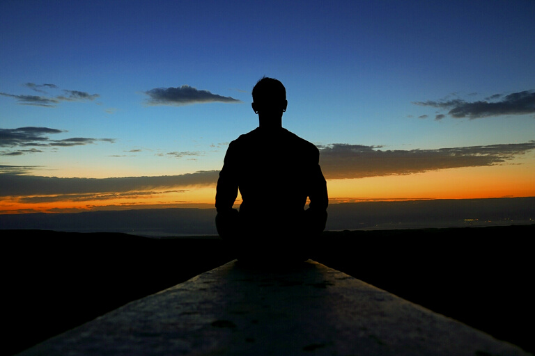 A Man on A Concrete Looking at Horizon
